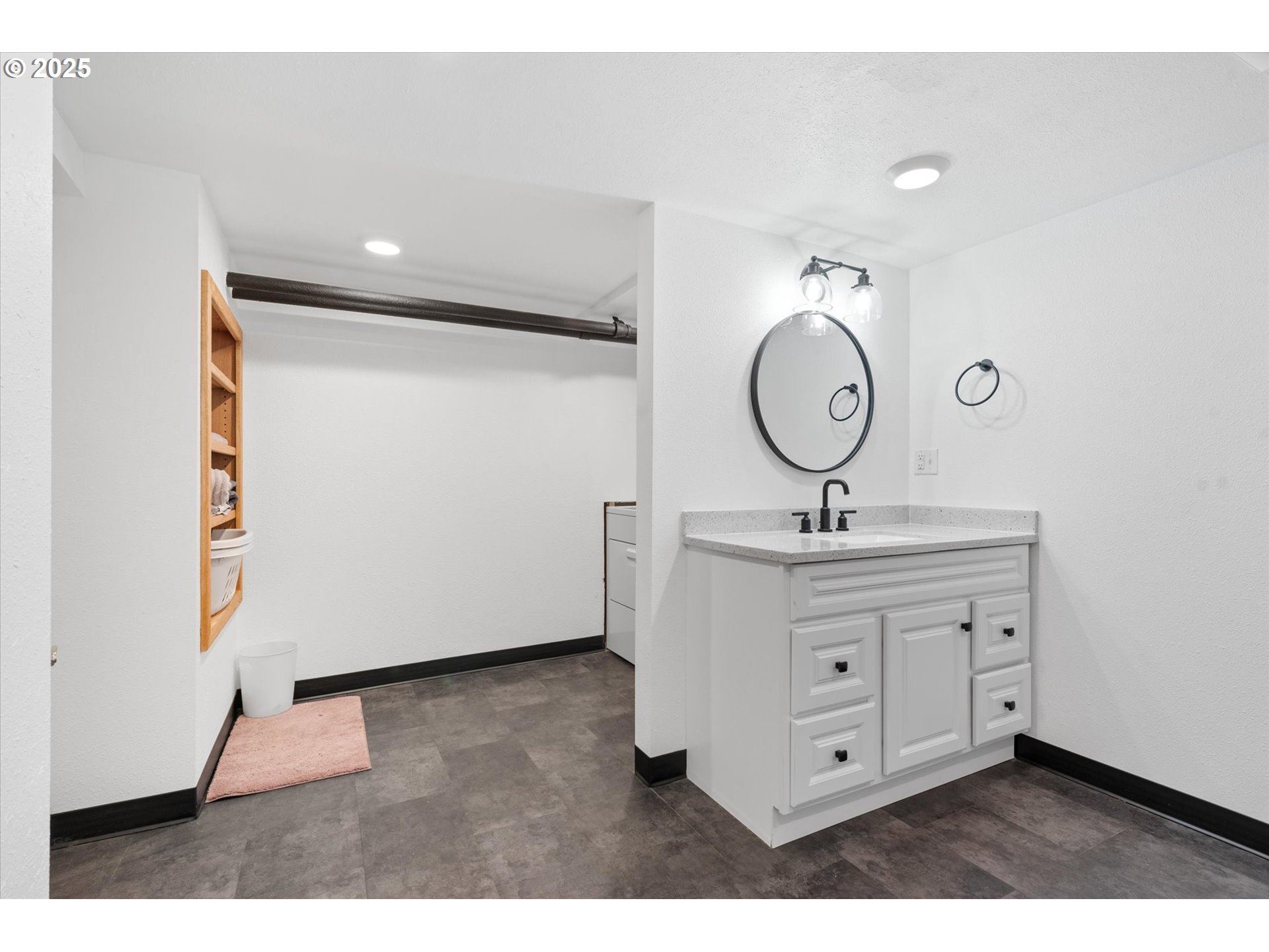 1402 2nd Street La Grande, OR 97850 - Photo 40 of 47 a view of a bathroom with a sink mirror and vanity