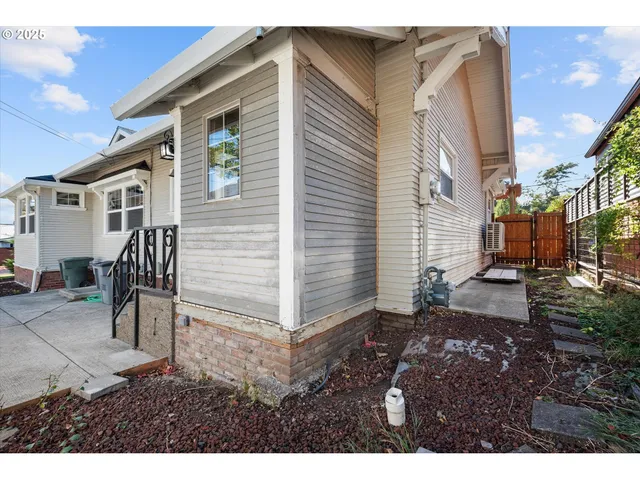 a view of a back yard of the house