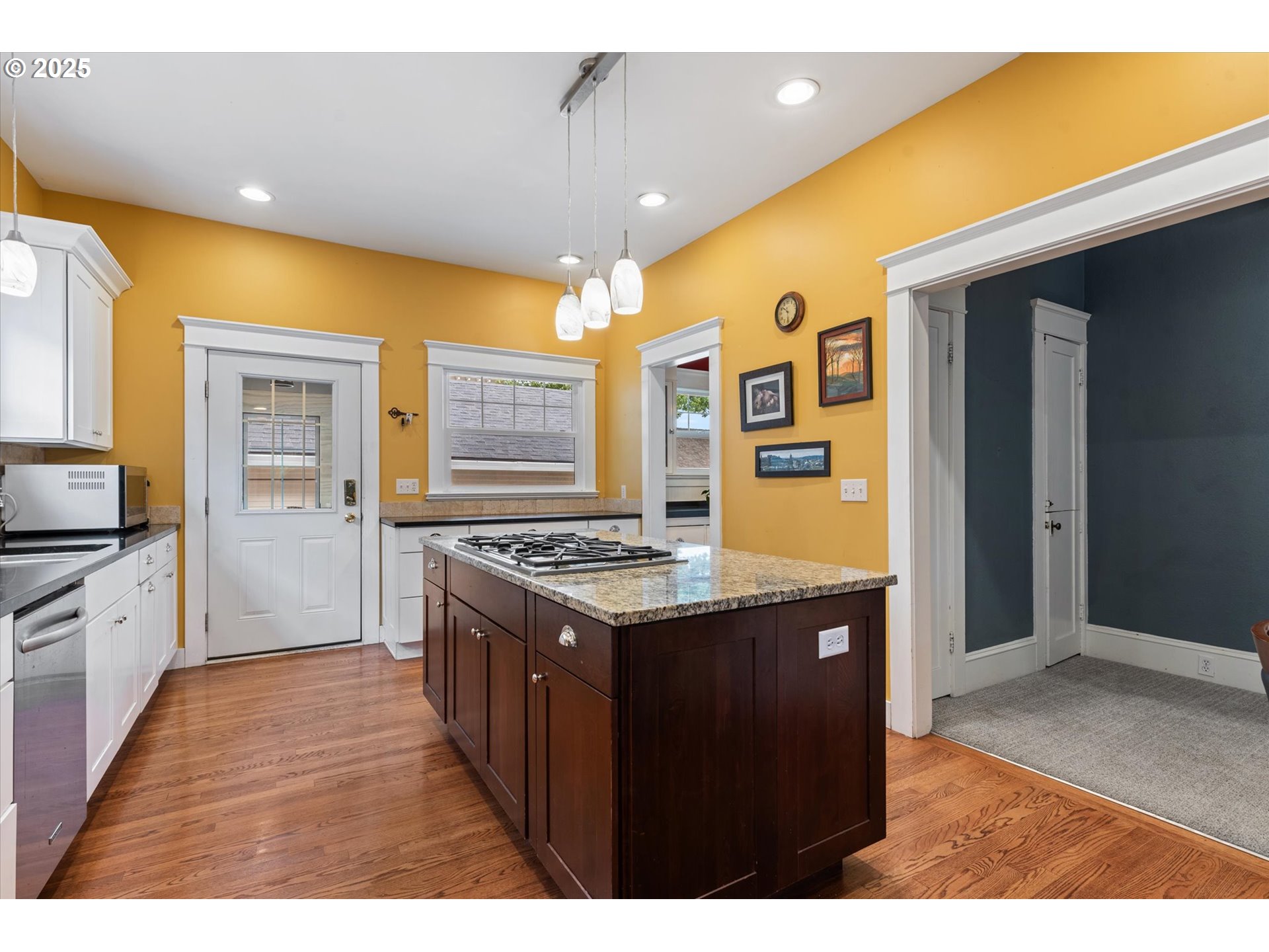 1402 2nd Street La Grande, OR 97850 - Photo 8 of 47 a kitchen with a stove and a refrigerator