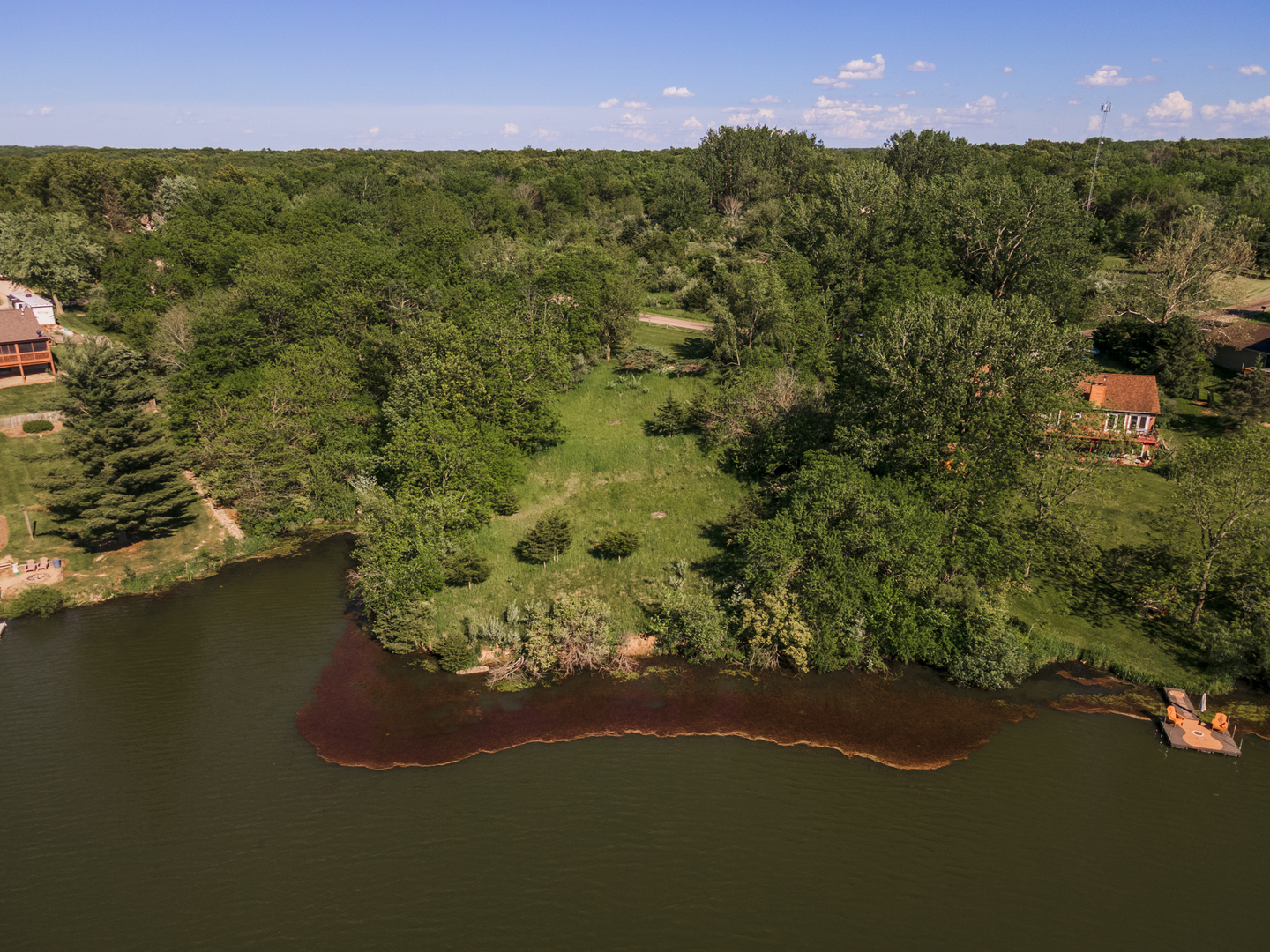 799 Kickapoo Drive Danvers, IL 61732 - Photo 5 of 7 a view of a lake with a field