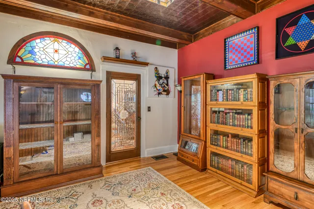 an aerial view of a house with a garden