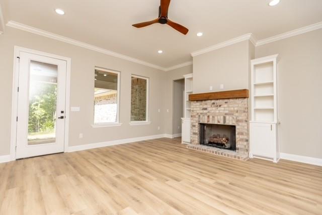 1025 VOSS Road Stonewall, LA 71078 - Photo 12 of 13 a view of an empty room with window and fire place