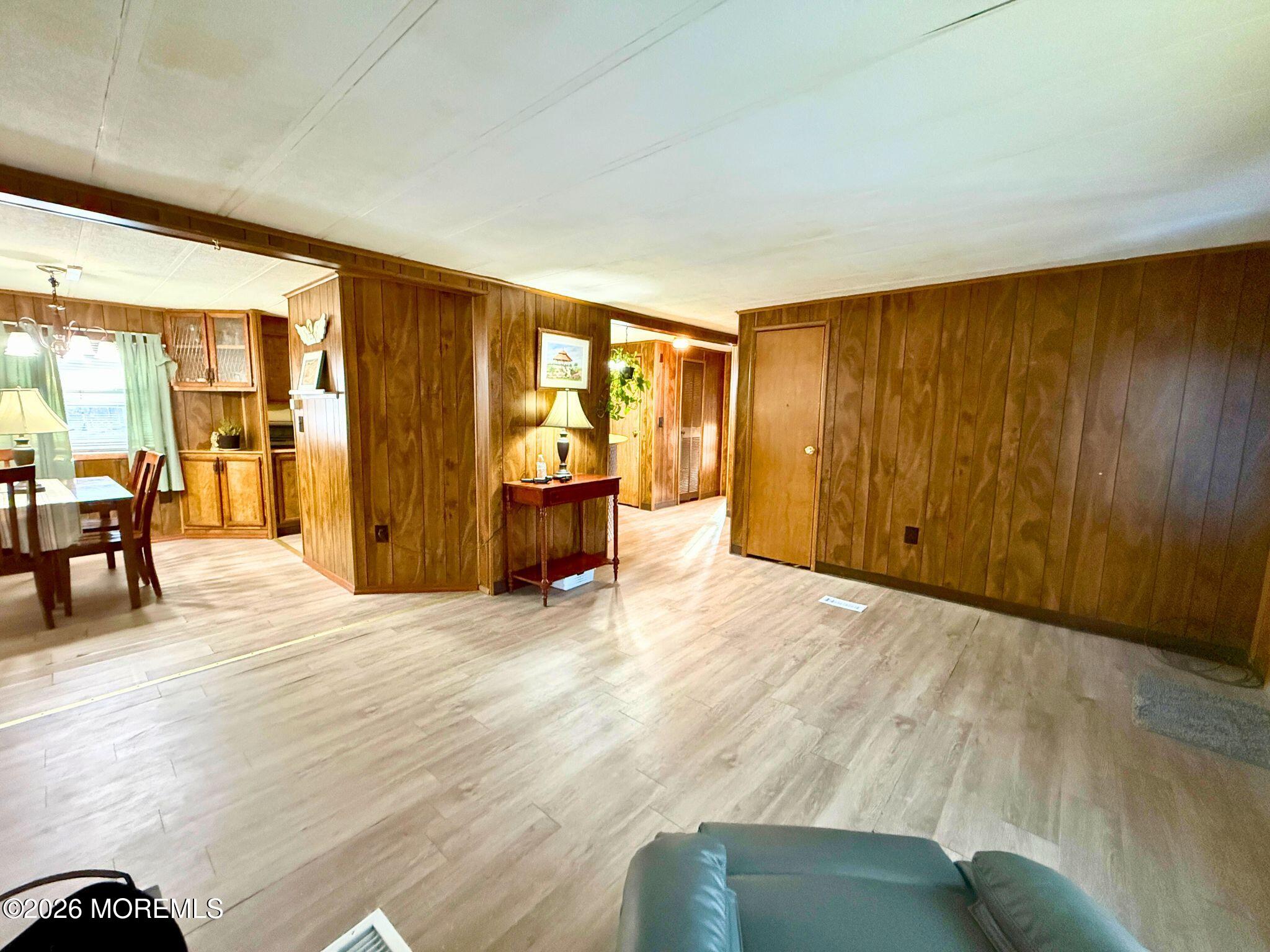 33 Judith Way Jackson, NJ 08527 - Photo 9 of 28 a view of empty room with furniture and wooden floor