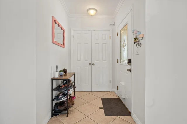a view of a hallway with closet