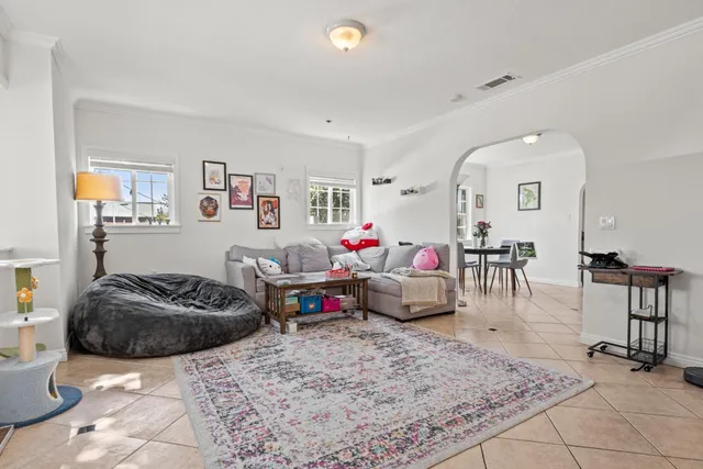 a living room with furniture and a couch