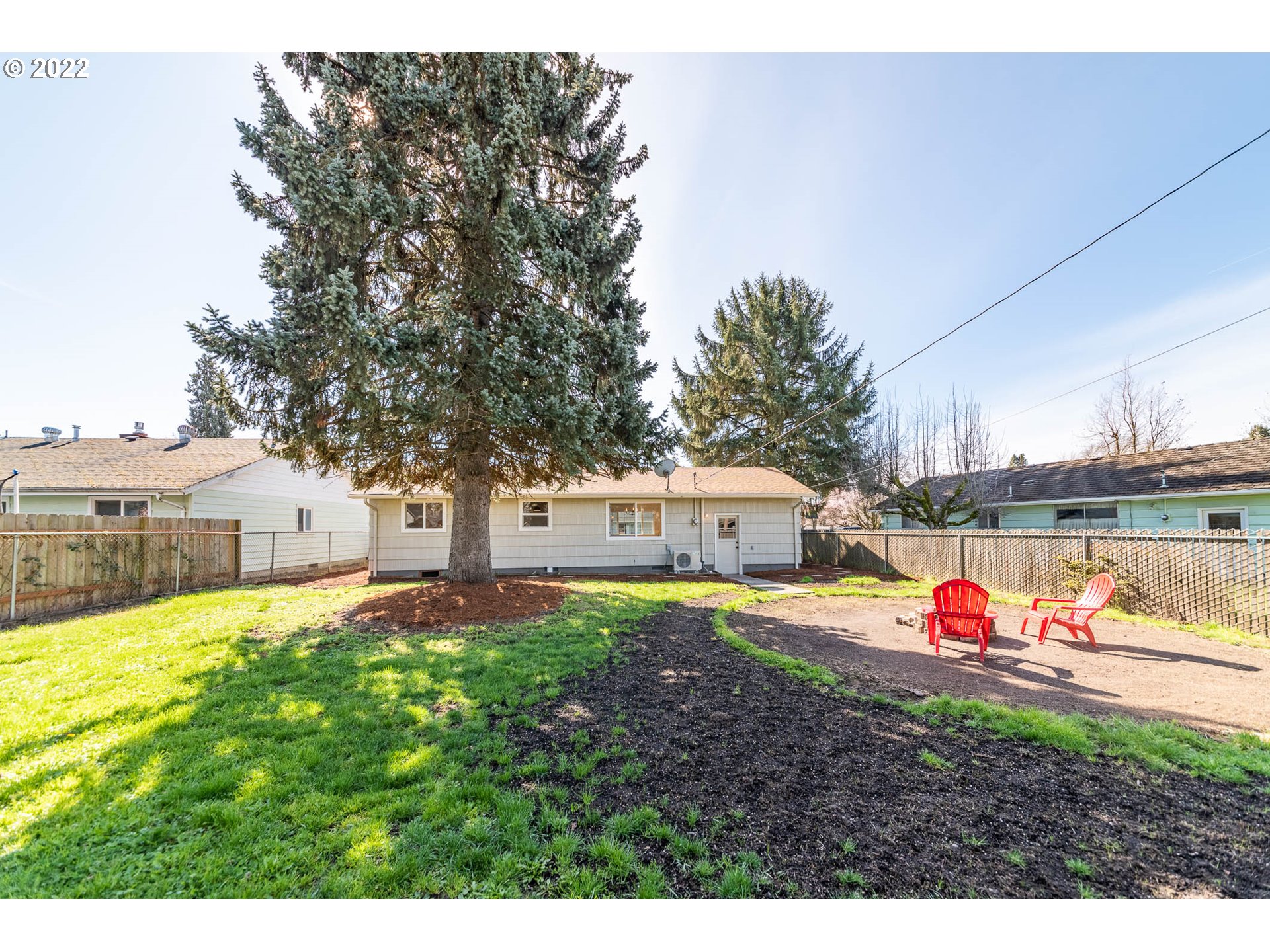 1218 N Street Springfield, OR 97477 - Photo 27 of 27 a front view of a house with garden