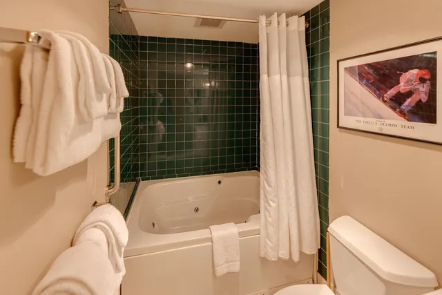 $299,000 | 48 Cooper Memorial Drive, Unit 111, Lincoln, NH 03251