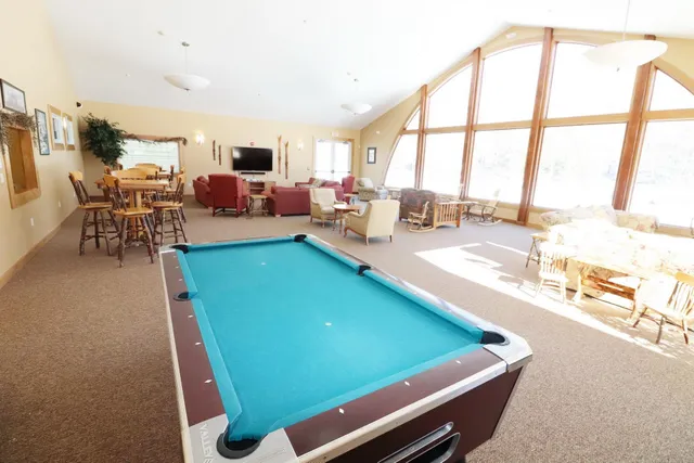 $299,000 | 48 Cooper Memorial Drive, Unit 111, Lincoln, NH 03251