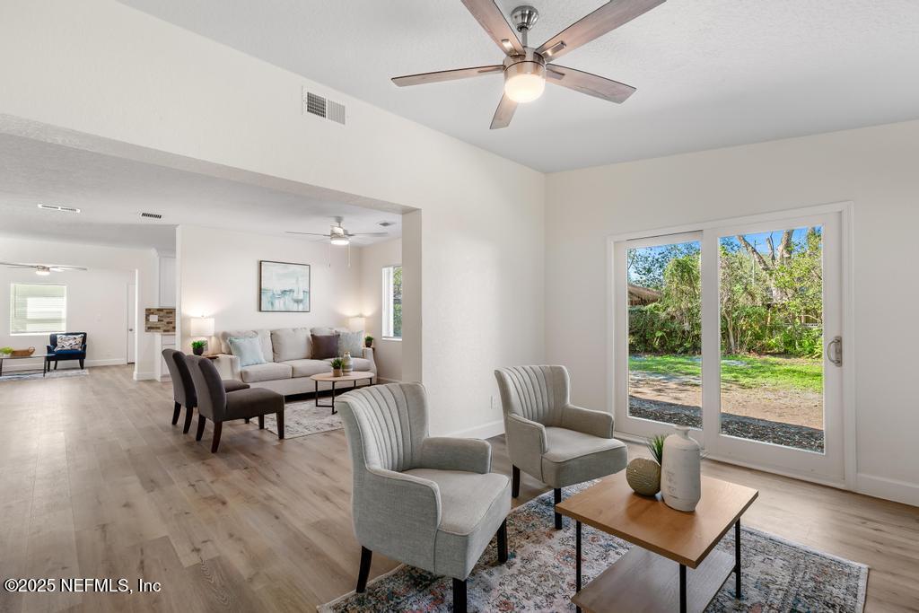7214 Hernando Road Jacksonville, FL 32217 - Photo 11 of 21 a living room with furniture and a large window