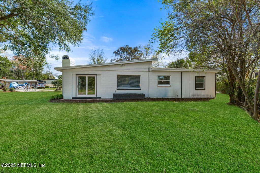 7214 Hernando Road Jacksonville, FL 32217 - Photo 20 of 21 a view of a house with a backyard