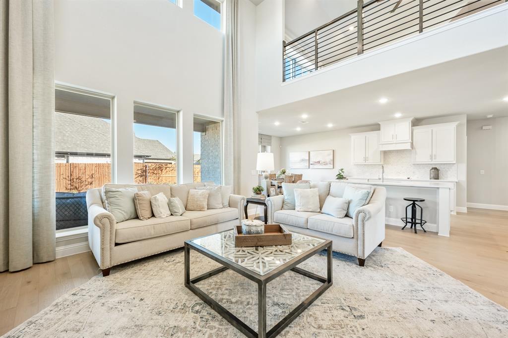 817 Rusty Run Drive Midlothian, TX 76065 - Photo 11 of 40 a living room with furniture white walls and a large window