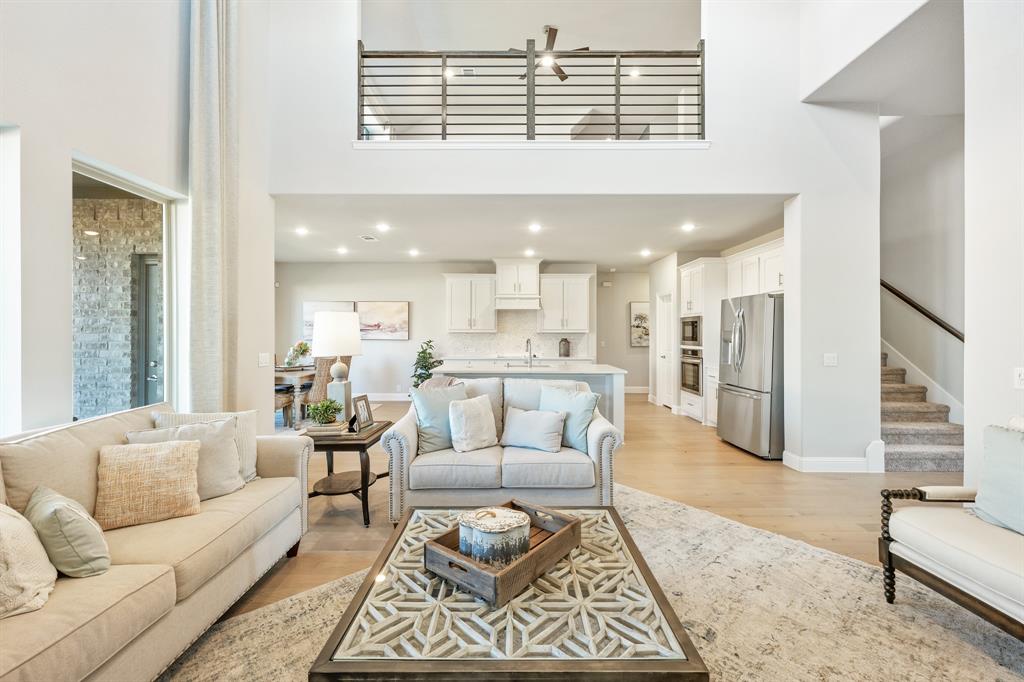 817 Rusty Run Drive Midlothian, TX 76065 - Photo 12 of 40 a living room with furniture and kitchen view