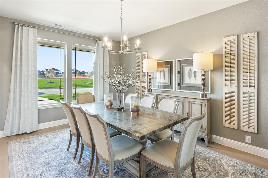 817 Rusty Run Drive Midlothian, TX 76065 - Photo 4 of 40 a view of a dining room and livingroom view