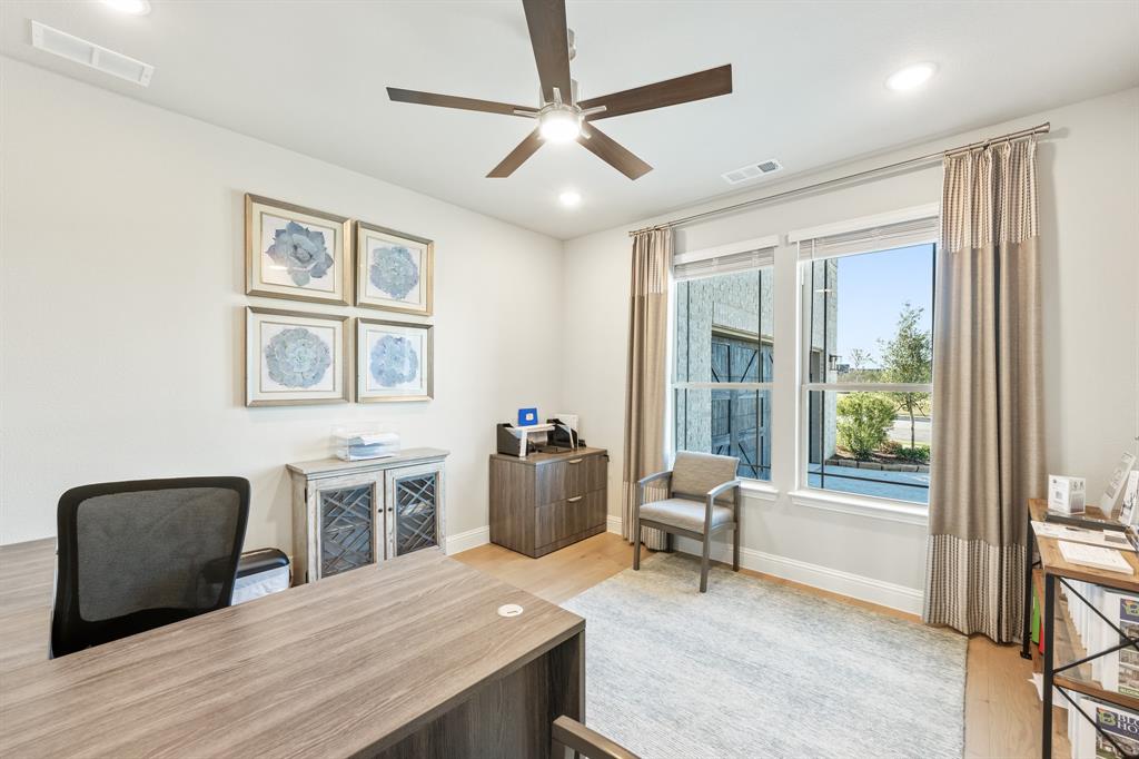817 Rusty Run Drive Midlothian, TX 76065 - Photo 7 of 40 a bedroom with furniture and a window