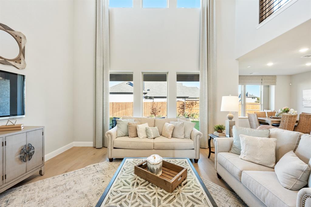 817 Rusty Run Drive Midlothian, TX 76065 - Photo 10 of 40 a living room with furniture a rug and a large window
