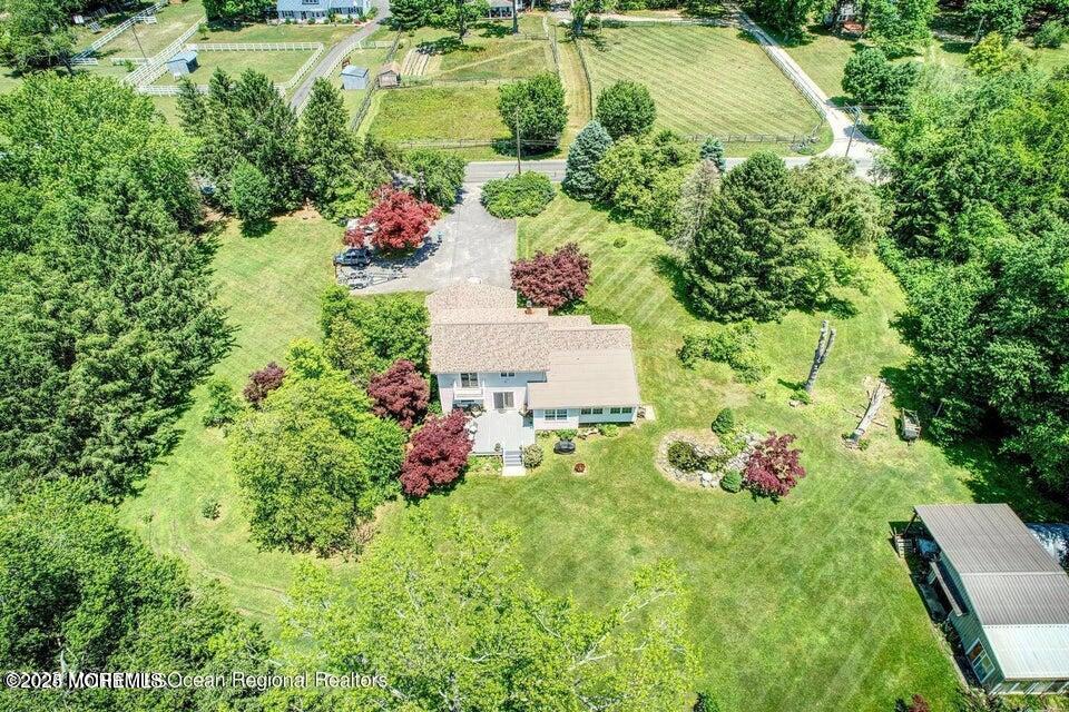 150 Easy Street Howell, NJ 07731 - Photo 7 of 23 an aerial view of residential house with outdoor space and swimming pool