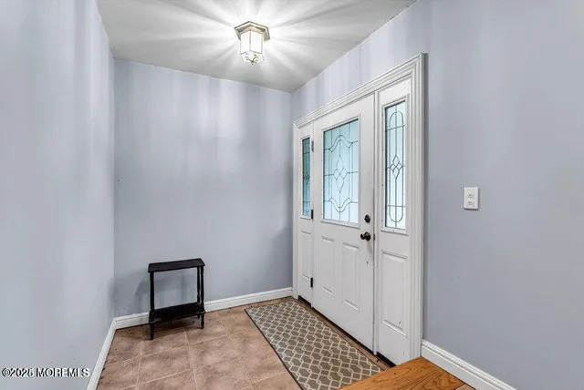a view of a hallway with closet