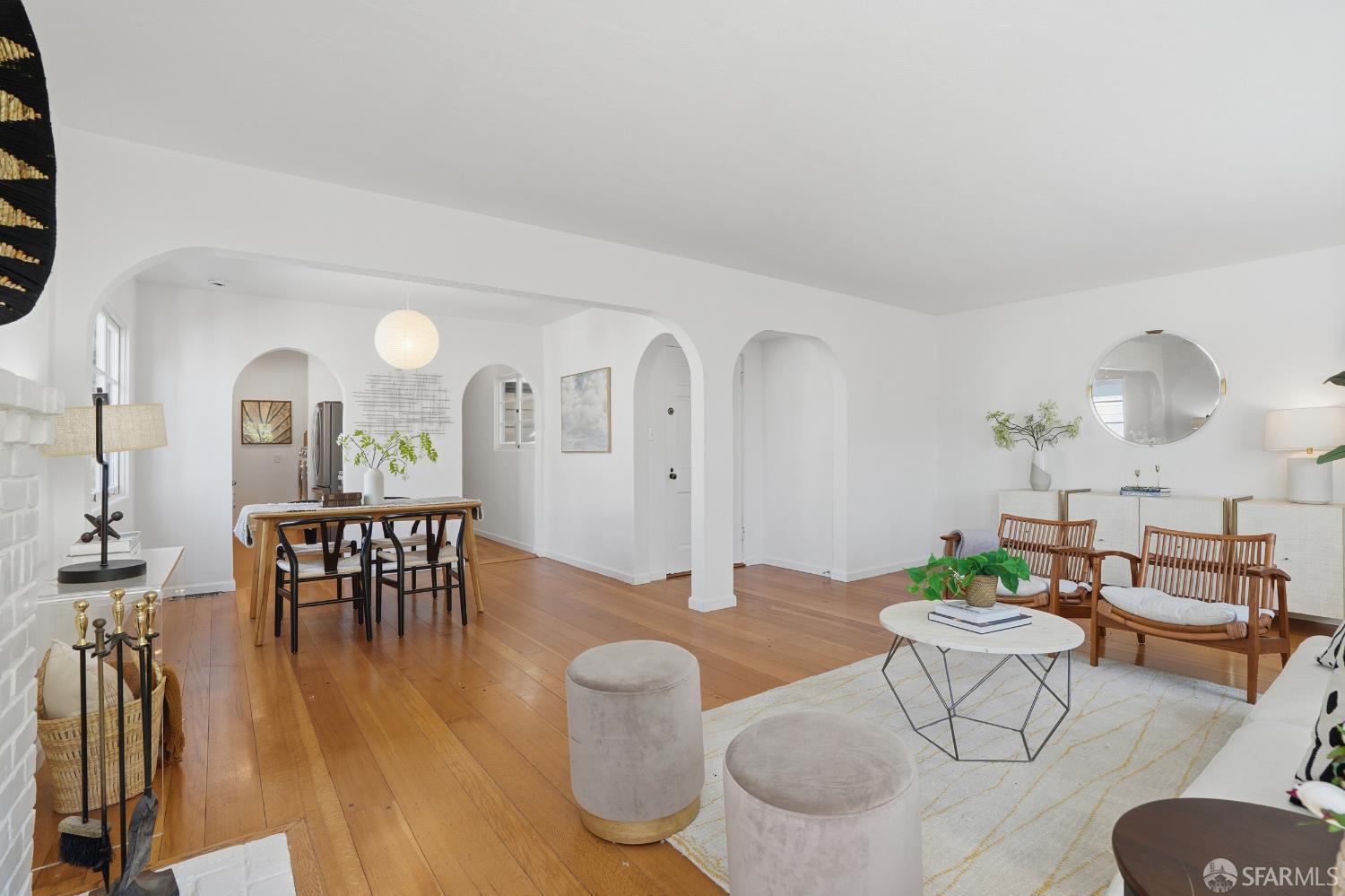 4614 Jacobus Avenue Oakland, CA 94618 - Photo 11 of 40 a living room with furniture and wooden floor