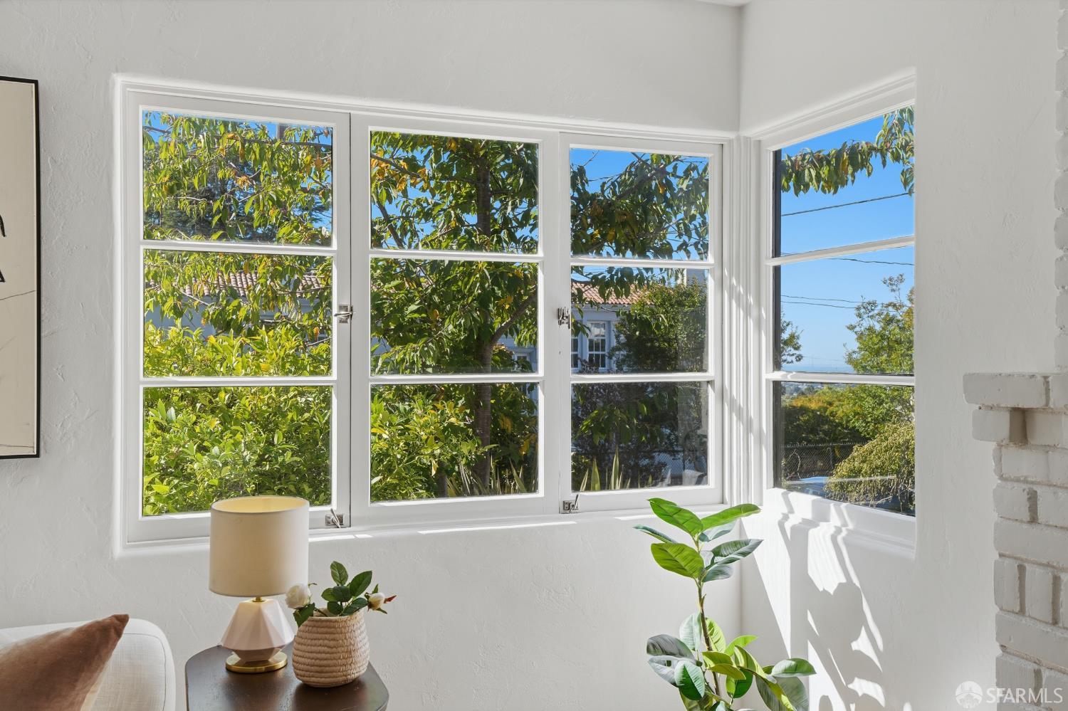 4614 Jacobus Avenue Oakland, CA 94618 - Photo 12 of 40 a view of a dining room with furniture window and outside view