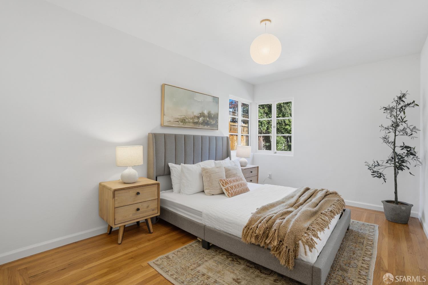 4614 Jacobus Avenue Oakland, CA 94618 - Photo 23 of 40 a bedroom with furniture and a window