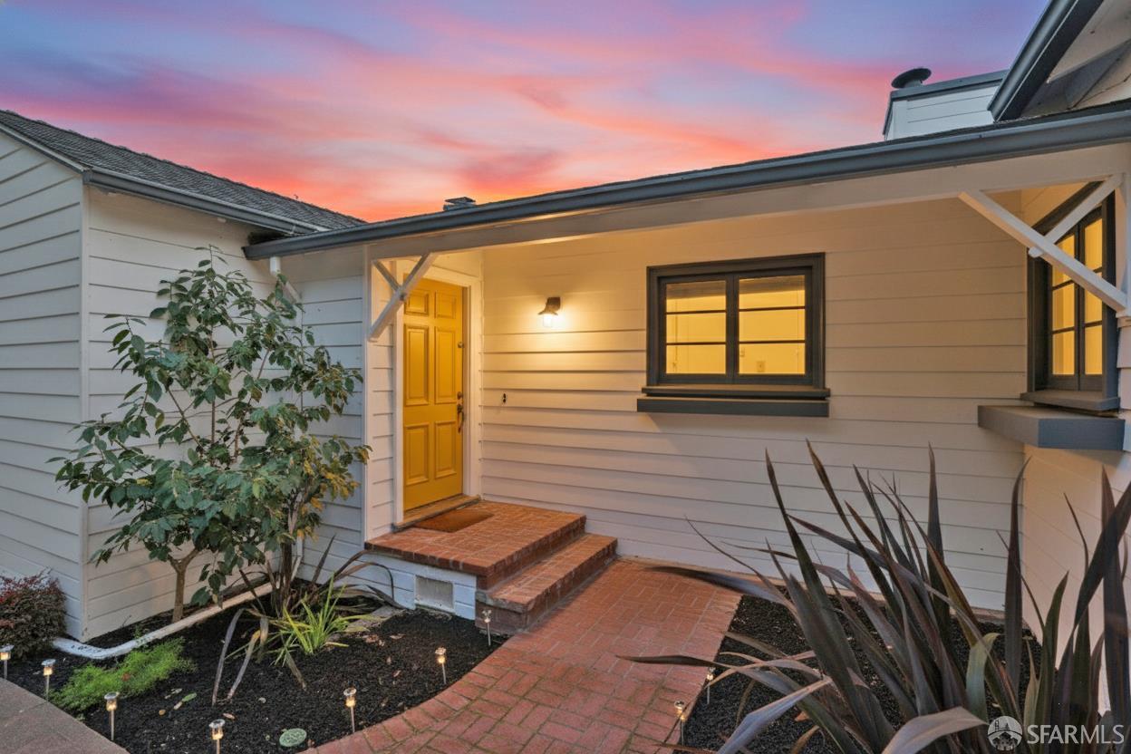 4614 Jacobus Avenue Oakland, CA 94618 - Photo 3 of 40 a front view of a house with garden