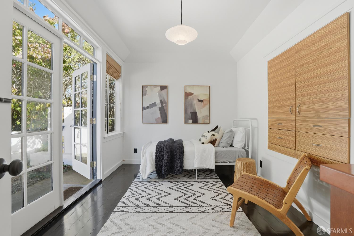 4614 Jacobus Avenue Oakland, CA 94618 - Photo 32 of 40 a living room with furniture and wooden floor