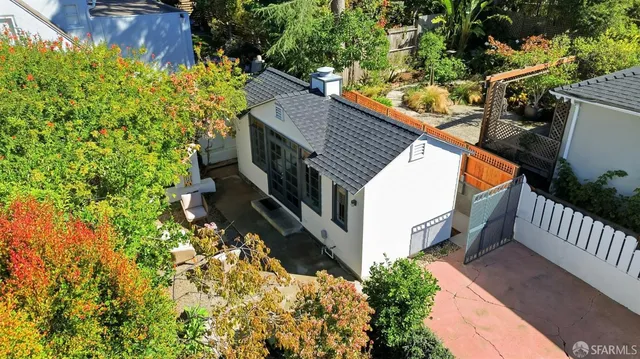 a backyard of a house with lots of green space