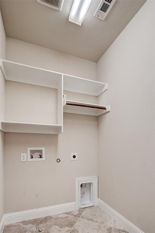 6156 Rilla Street Frisco, TX 75035 - Photo 12 of 32 a view of a store room with shelf