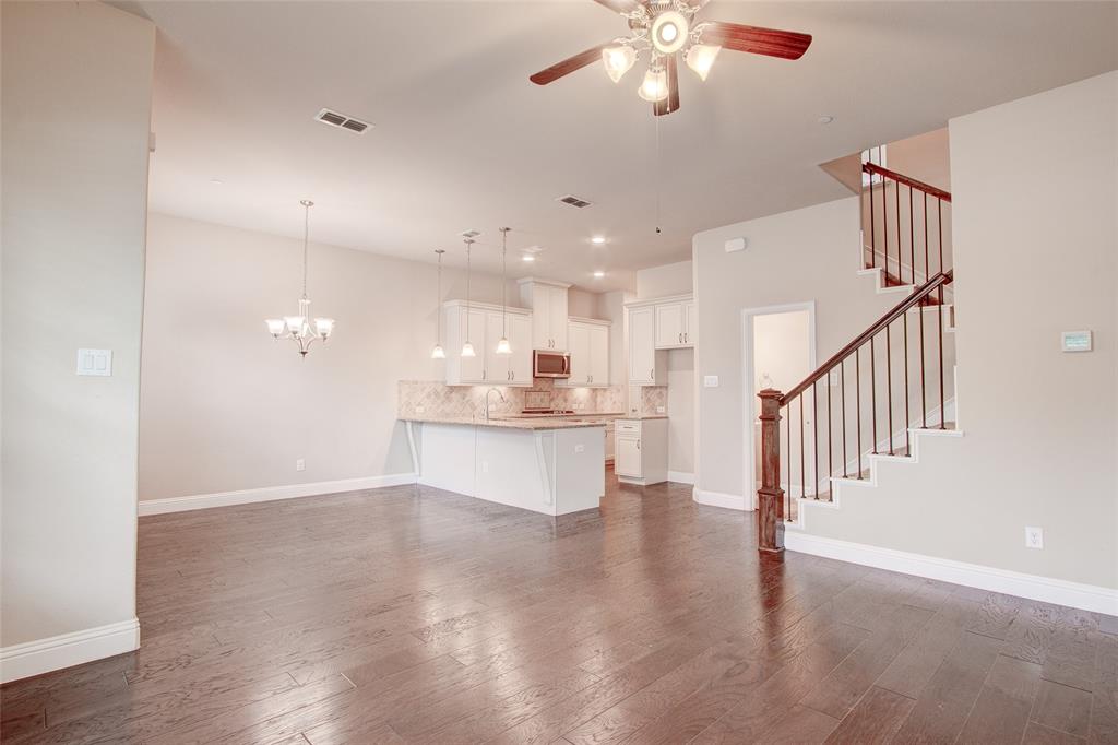 6156 Rilla Street Frisco, TX 75035 - Photo 21 of 32 a view of kitchen with stove and wooden floor