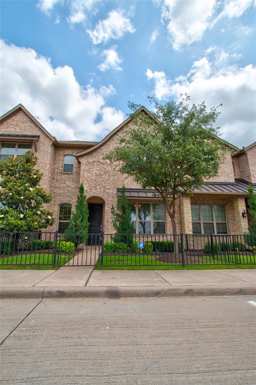 6156 Rilla Street Frisco, TX 75035 - Photo 26 of 32 a view of a white house next to a yard with big trees
