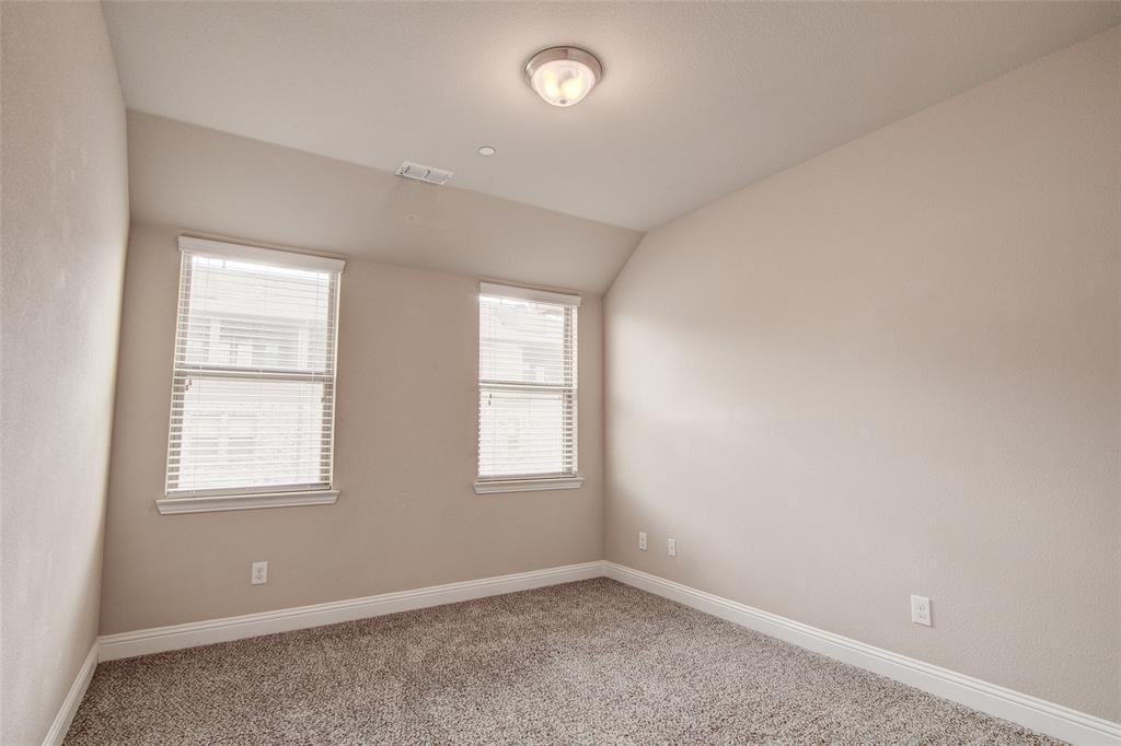 6156 Rilla Street Frisco, TX 75035 - Photo 28 of 32 an empty room with windows