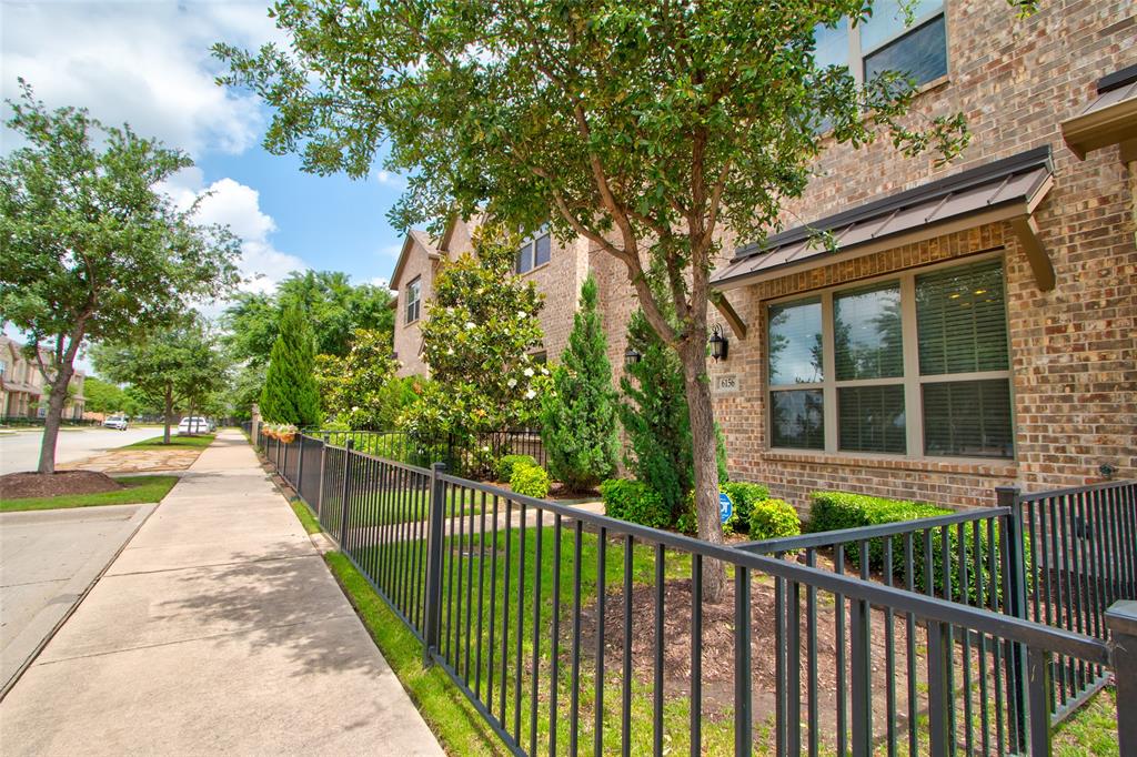 6156 Rilla Street Frisco, TX 75035 - Photo 3 of 32 a view of a house with a small yard and wooden fence