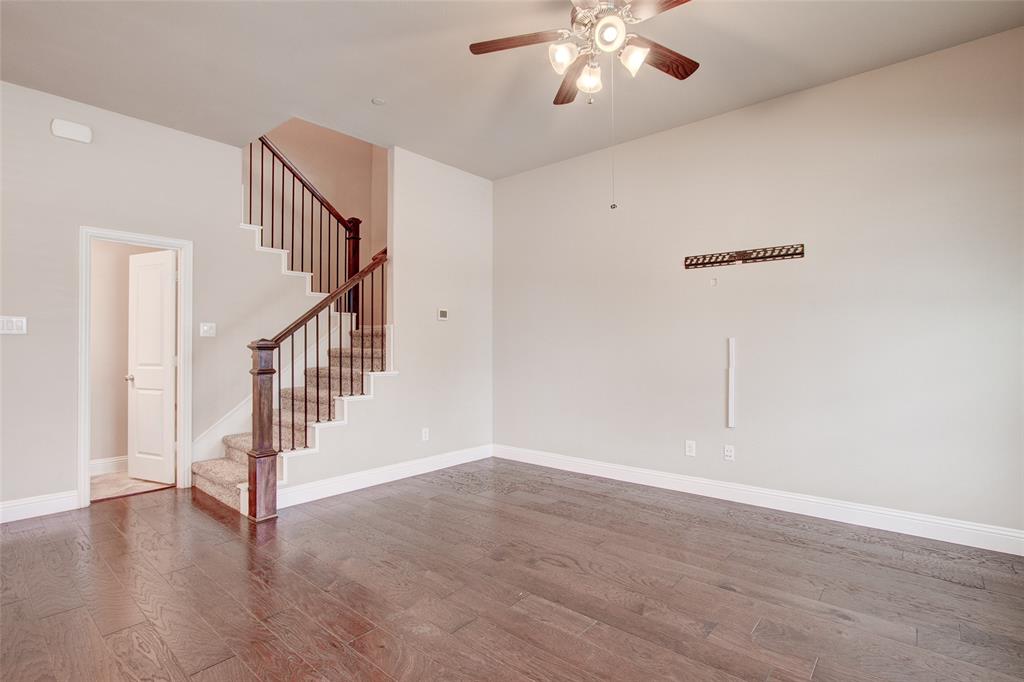 6156 Rilla Street Frisco, TX 75035 - Photo 32 of 32 a view of empty room with wooden floor