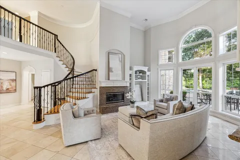 a view of living room with furniture and a window