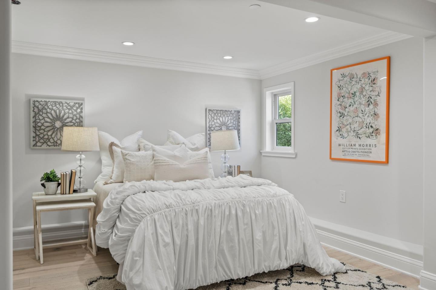 511 Corbitt Drive Burlingame, CA 94010 - Photo 22 of 43 a bedroom with a bed and a lamp on dresser
