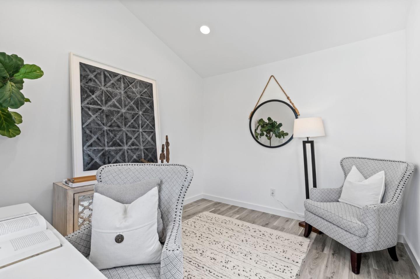 511 Corbitt Drive Burlingame, CA 94010 - Photo 23 of 43 a living room with furniture and a window