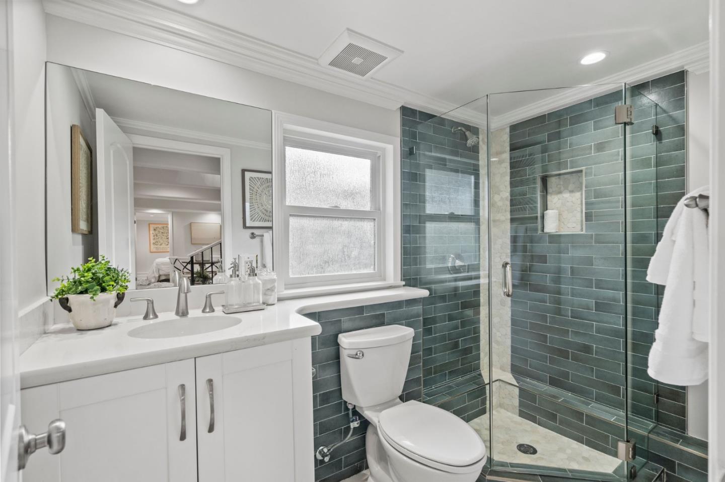 511 Corbitt Drive Burlingame, CA 94010 - Photo 28 of 43 a bathroom with a sink a toilet and shower