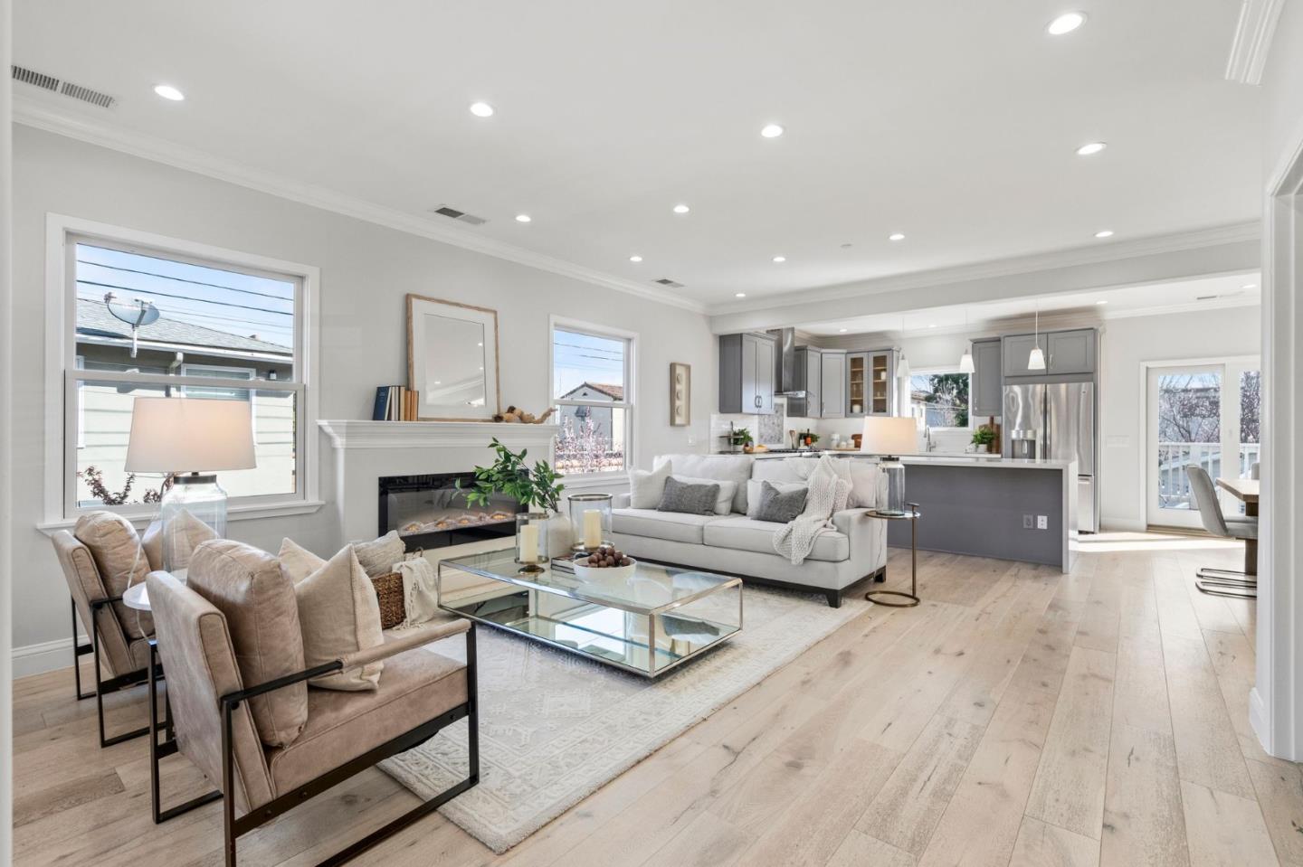511 Corbitt Drive Burlingame, CA 94010 - Photo 5 of 43 a living room with furniture and a fireplace