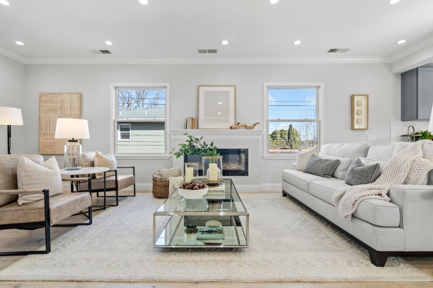 511 Corbitt Drive Burlingame, CA 94010 - Photo 6 of 43 a living room with furniture and a fireplace