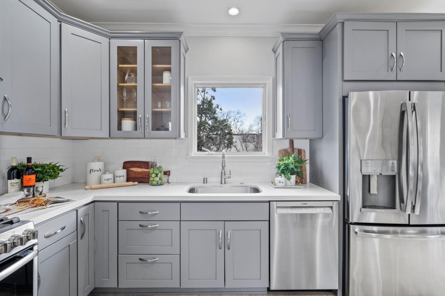 511 Corbitt Drive Burlingame, CA 94010 - Photo 9 of 43 a kitchen with a sink stainless steel appliances and cabinets
