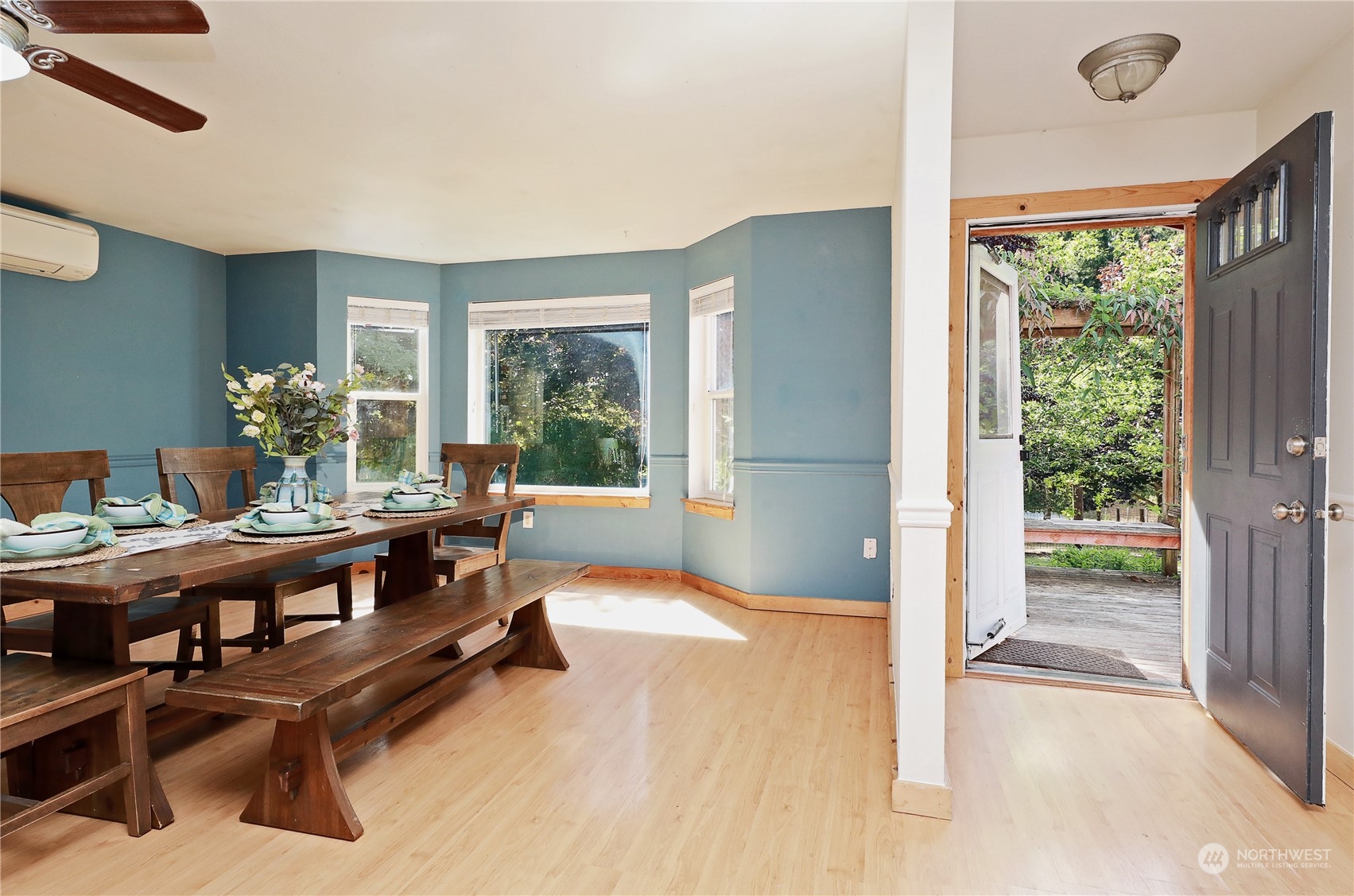 5493 Langley Road Langley, WA 98260 - Photo 5 of 36 a living room with furniture and a large window