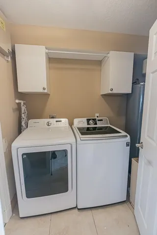 a work room with chairs and a table