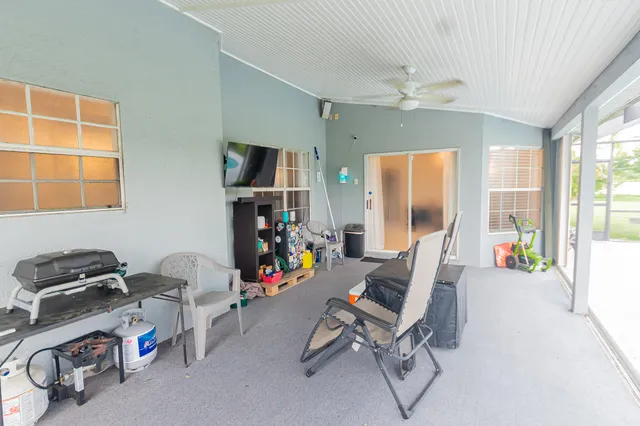 a view of a swimming pool with a patio
