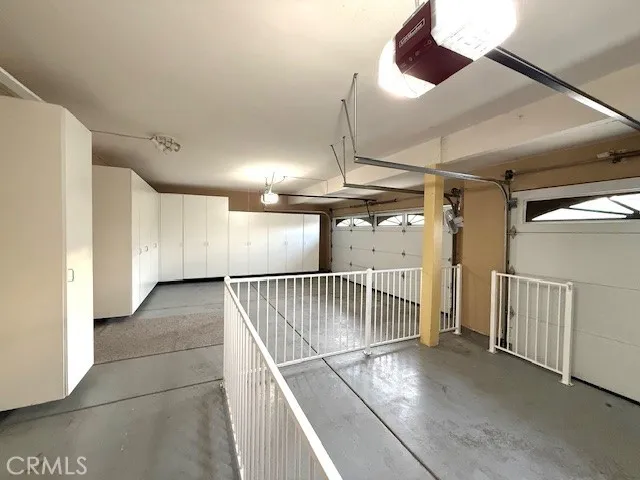 a view of a hallway with stairs