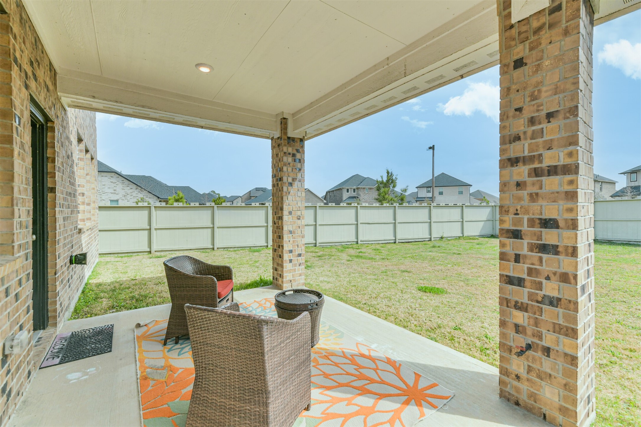 17465 Buckeye Branch Conroe, TX 77385 - Photo 33 of 47 Covered patio perfect for morning coffee, quiet evenings, and entertaining