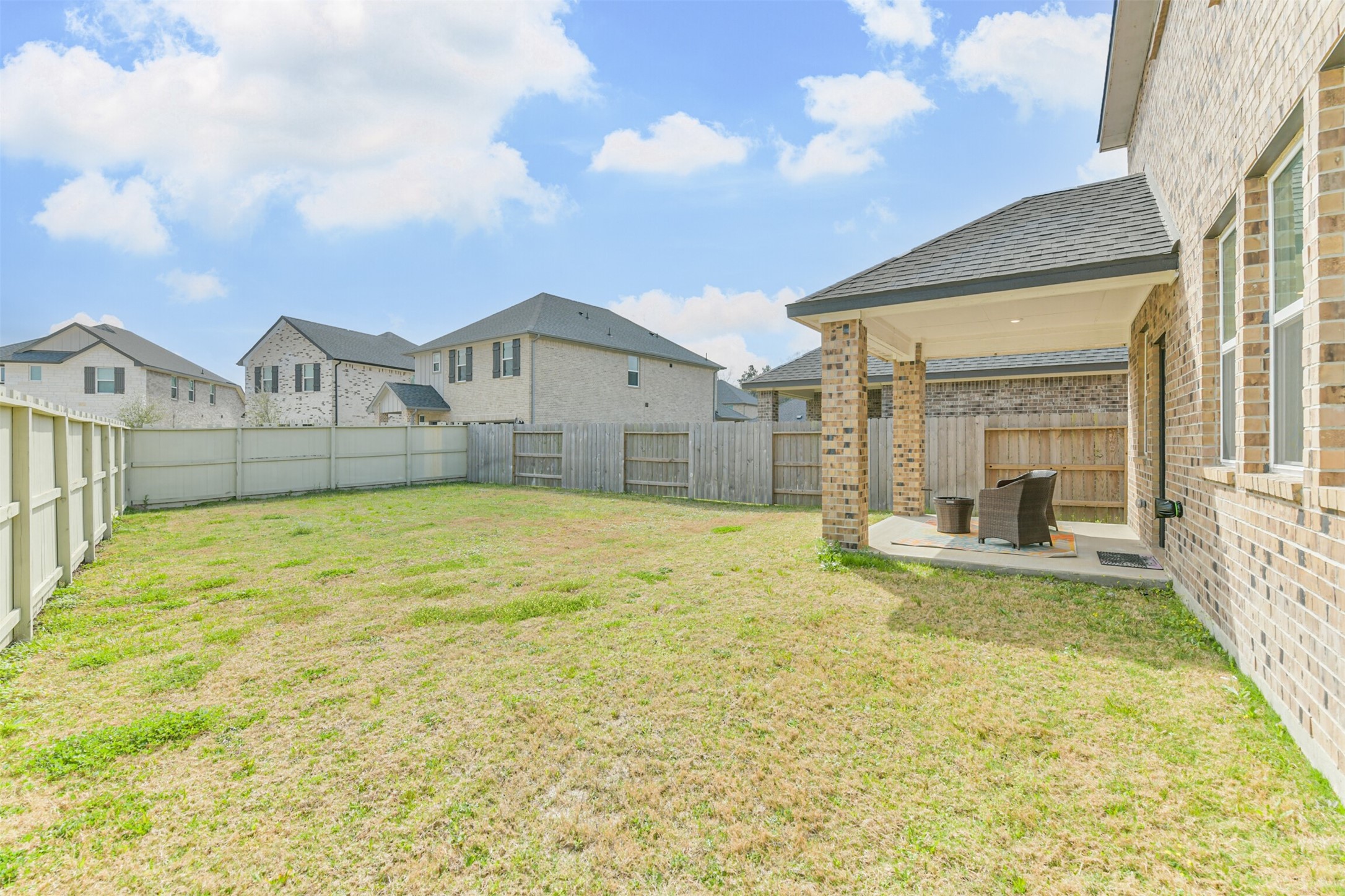 17465 Buckeye Branch Conroe, TX 77385 - Photo 34 of 47 Large fully fenced backyard spacious enough for pool, playground, gardening, or whatever your heart desires!