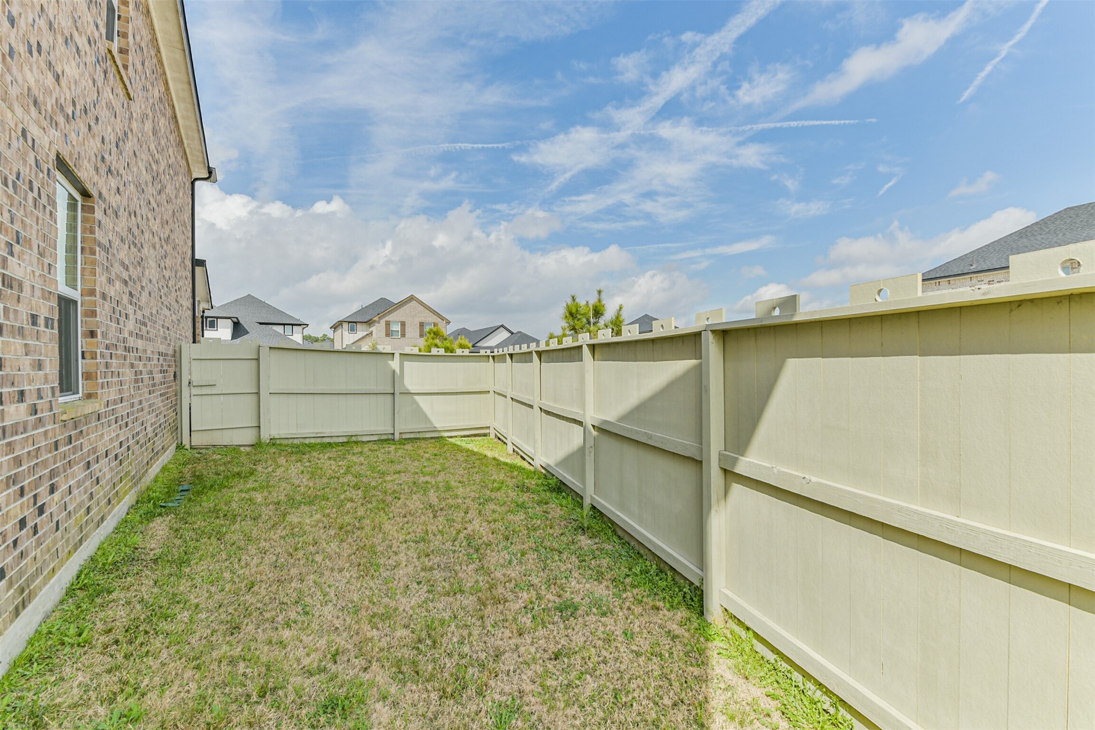 17465 Buckeye Branch Conroe, TX 77385 - Photo 36 of 47 Side view of backyard spacious enough for playing with pets