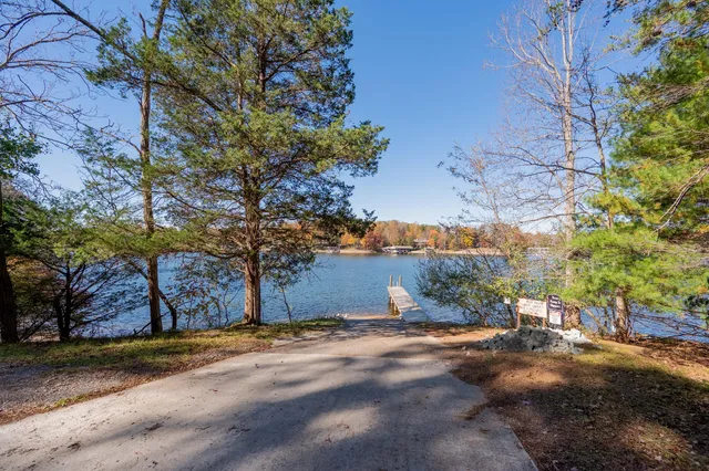a view of a lake with mountain in the background
