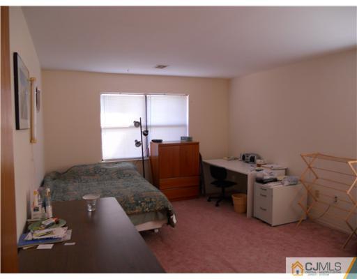 1624 Raspberry Court Edison, NJ 08817 - Photo 2 of 7 a living room with furniture