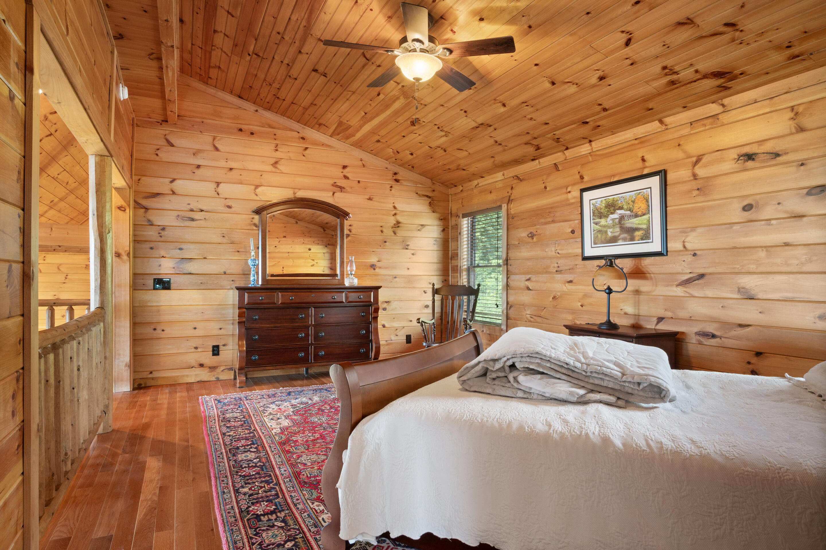316 Reflections Pt Trail Fancy Gap, VA 24328 - Photo 27 of 78 a spacious bedroom with a bed and a dresser